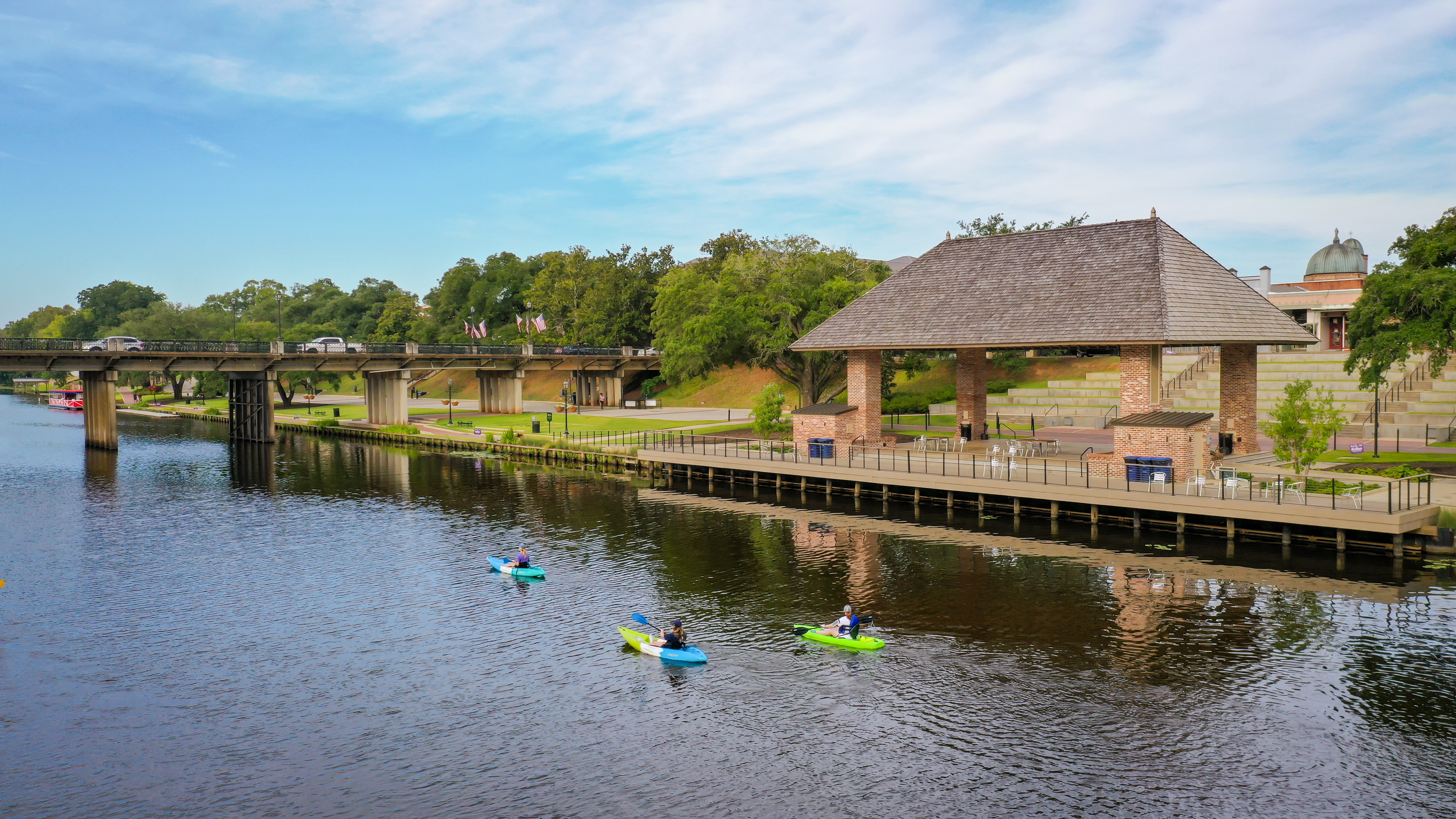Kayakers paddle in Natchitoches.