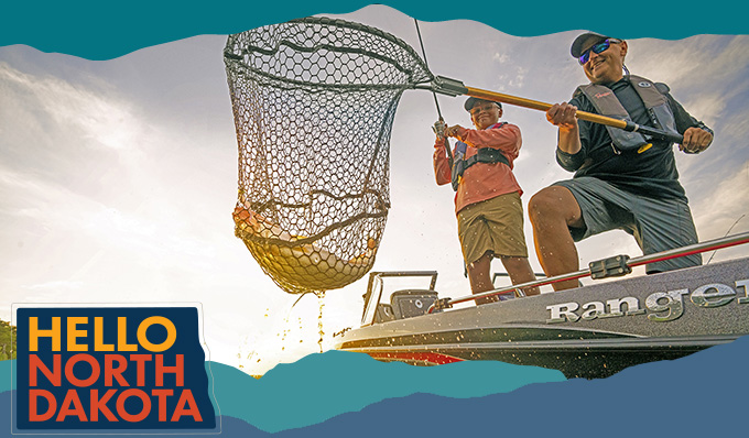 Child and Man fishing on a boat with a net