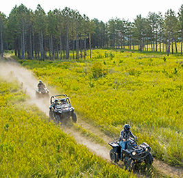 Riding 4-wheelers on trail