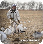 person hunting in a field