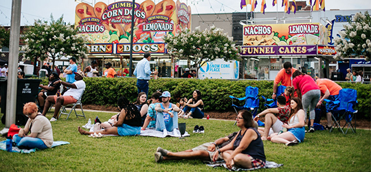 A crowd of people enjoy live music in Ruston, Louisiana.