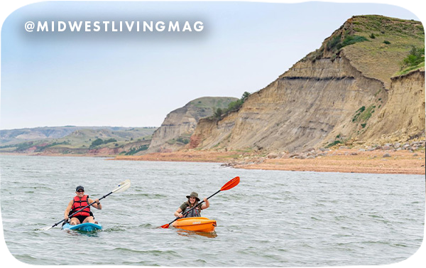 2 kayaks on a lake @midwestlivingmag