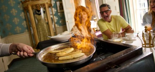 Guests enjoy table-side preparation of Brennan's bananas foster. 