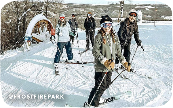 Group of young girls skiing and smiling