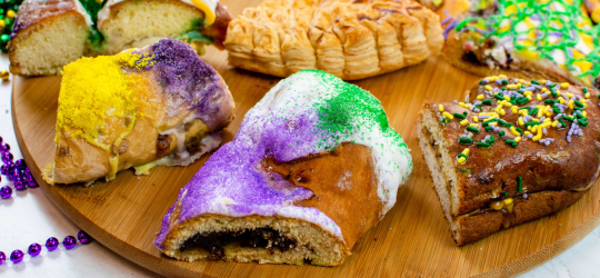 A variety of king cakes atop a platter from Lafayette, Louisiana. 