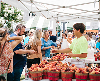 People shop for peaches at the Annual Louisiana Peach Festival.