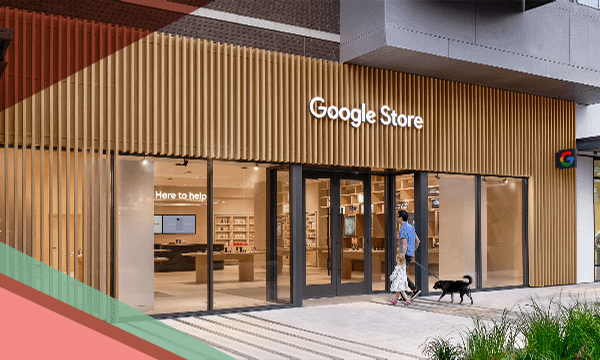 A man, child and leashed dog approach the entrance of the Google Store
