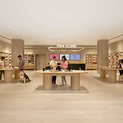 People look at Google products at kiosks inside the store