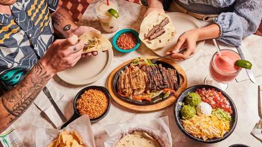 A table of Tex-Mex food at Chuy's in Austin, Texas