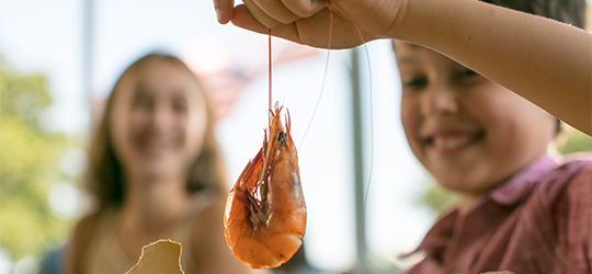 Two children enjoy the Louisiana Shrimp & Petroleum Festival.