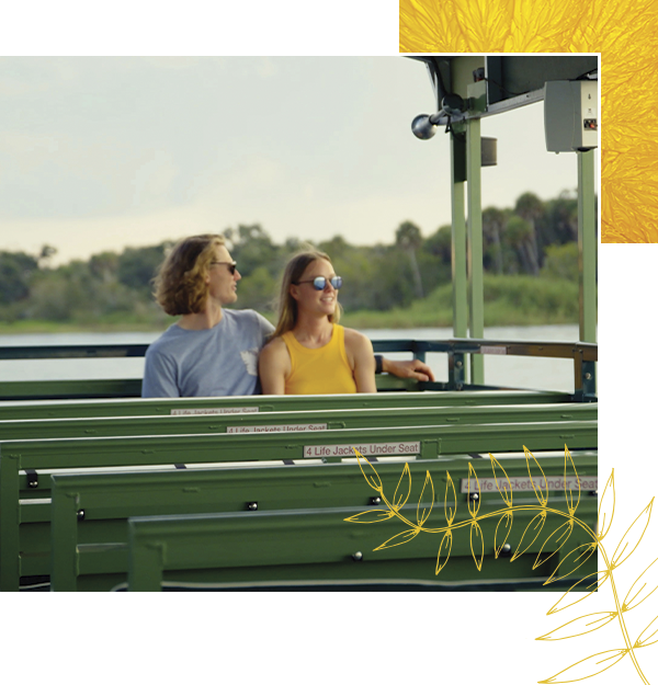 couple on a boat tour of myakka river in florida