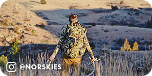 View from behind of a man wearing camouflage and carrying hunted birds, with overlay text that reads: @norskies