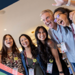 Five enthusiastic attendees pose for a phone during CEMA Summit 2025 in July in Austin, Texas