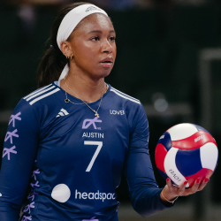 LOVB Austin star volleyball player Asjia O'Neal is ready to serve a volleyball during a League One Volleyball match
