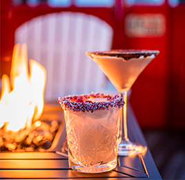 Festive cocktails around a fire pit at the Boathouse in Kennebunkport. 