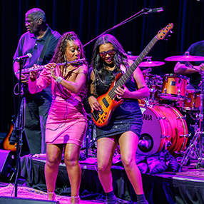 Musicians Jazmin Ghent on flute and Mohini Dey on bass perform at the Women in Jazz concert in Austin, Texas
