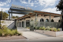 An exterior view of the Assembly Hall event space and its courtyard in East Austin