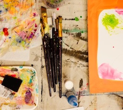paints and paintbrushes at sarasota art gallery