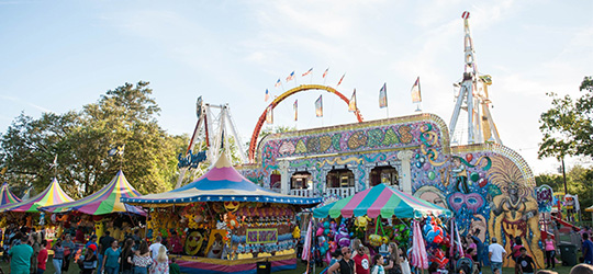 Carnival rides and games at Ponchatoula Strawberry Festival.