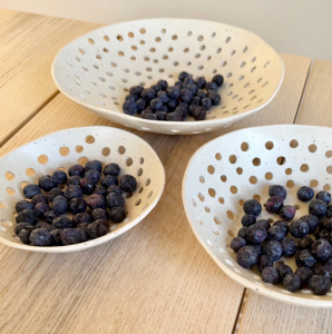 Fruit bowl full of fresh blueberries