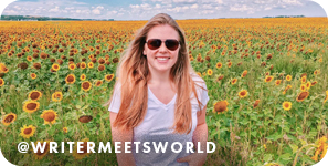 Woman wearing sunglasses smiling in a field of sunflowers, with overlay text that reads: @writermeetsworld