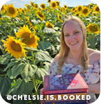 Woman holding books and posing in a field of sunflowers, with overlay text that reads: @chelsie.is.booked