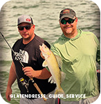 Two men standing on a boat holding a fishing pole and a caught fish, with overlay text that reads: @latendresse_guide_service
