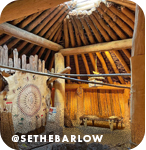Interior of a wood structure with Indigenous art, with overlay text that reads: @sethebarlow