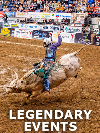 Person riding a bucking bull in a rodeo arena, with overlay text that reads: Legendary Events