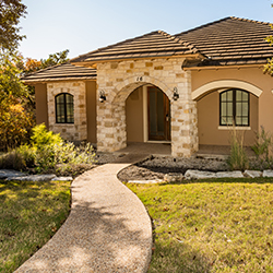 Exterior view of one of the newly introduced luxury resort homes at Omni Barton Creek Resort & Spa in the Texas Hill Country