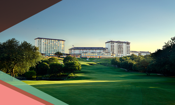 Rolling green hills and a golf course encircle the luxurious Omni Barton Creek Resort & Spa in Austin, Texas