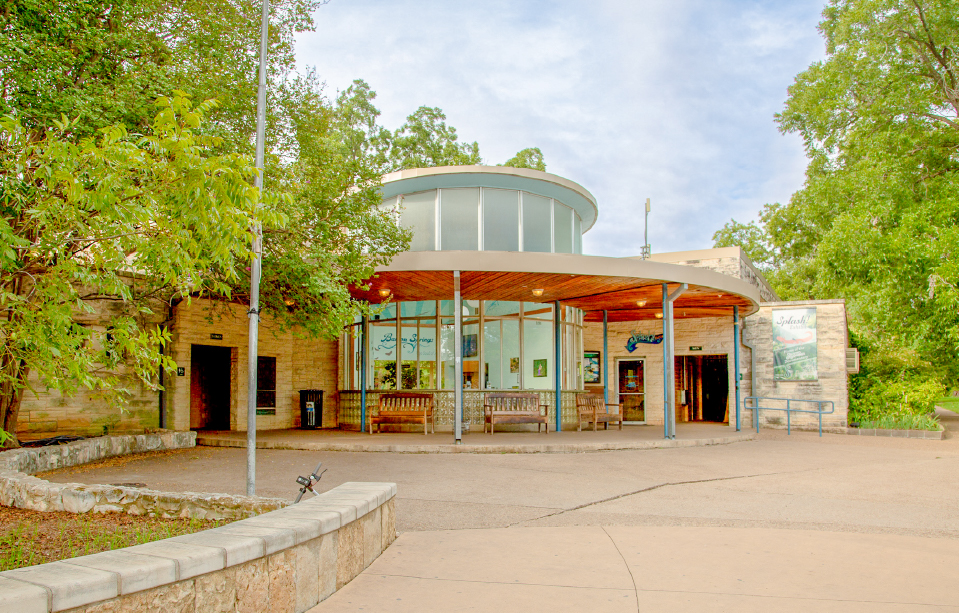 The exterior of the 1947 Joan Means Khabele Bathhouse at Barton Springs in Austin, Texas