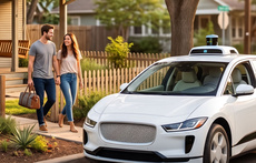 Rendering of two people walking toward a white Waymo autonomous electric SUV 