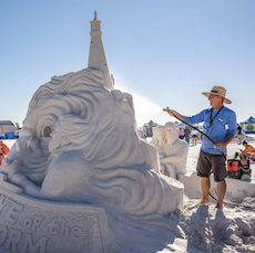 sand sculpter on beach in siesta key florida