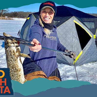 Smiling woman holding a spear with a caught fish on it in a snowy landscape, with overlay text that reads Hello North Dakota